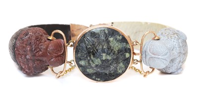Lot 115 - A Victorian carved specimen lava hinged bangle