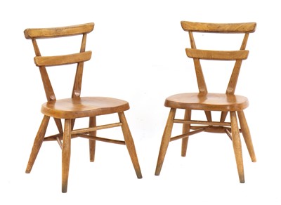 Lot 238 - A pair of Ercol white dot child's chairs