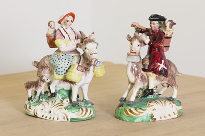 Lot 185 - A pair of Staffordshire pottery figures