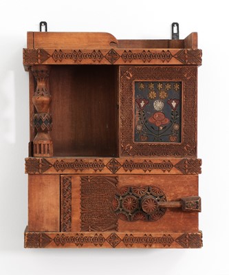 Lot 35 - A chip-carved wooden wall-hanging cabinet