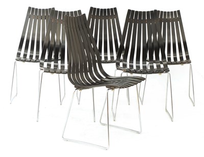 Lot 705 - A set of six ebonised 'Scandia' chairs