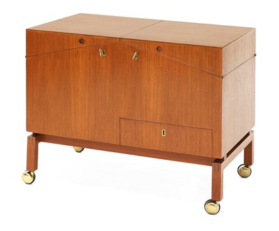 Lot 584 - A teak bar trolley or cart