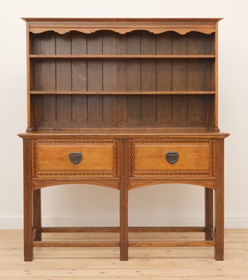 Lot 106 - An Arts and Crafts oak and chequer inlaid dresser