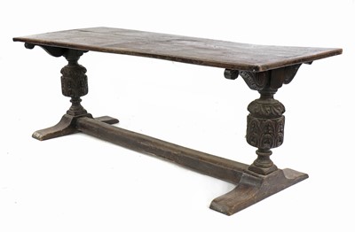 Lot 242 - An oak refectory table