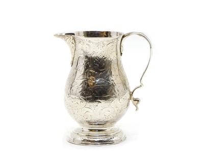 Lot 9 - A George II sparrow beak cream jug