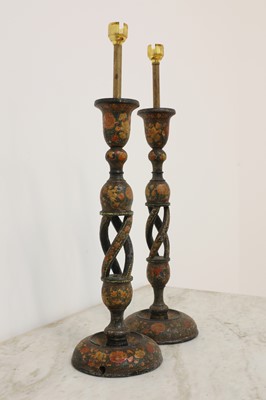 Lot 50 - A pair of Indian papier mâché candlesticks