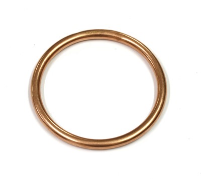 Lot 116 - A 9ct gold hollow round section bangle, by Henry Griffith & Son