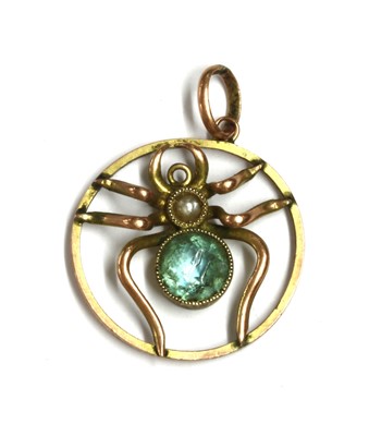 Lot 19 - An Edwardian gold paste and split pearl spider pendant