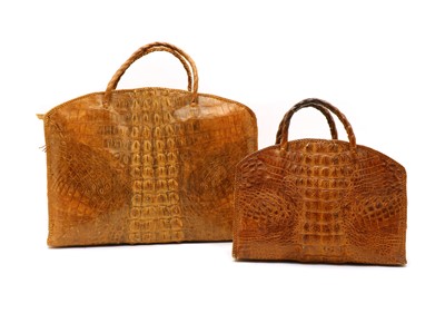 Lot 131 - A 1950s crocodile skin travel bag