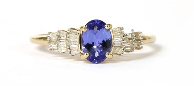 Lot 308 - A gold tanzanite and diamond ring