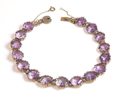Lot 56 - A Victorian gilt metal amethyst rivière necklace