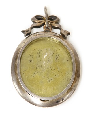 Lot 202 - A Continental silver and gold paste set glazed locket/pendant