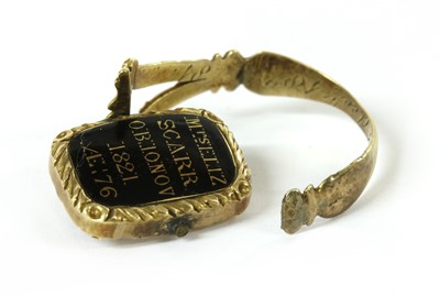 Lot 1 - A Georgian gold enamel memorial swivel ring