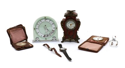 Lot 84 - A French tortoiseshell and brass mantle clock