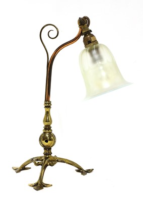 Lot 142 - An Arts and Crafts copper and brass table lamp