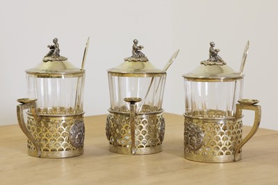 Lot 27 - A set of three Russian silver gilt tea glass holders