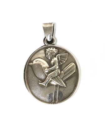 Lot 10 - A white metal locket