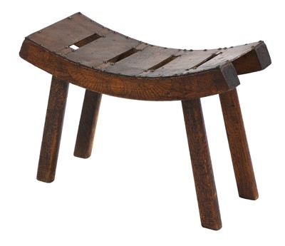 Lot 14 - An Arts and Crafts 'Egyptian' pine stool