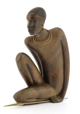 Lot 317 - A Hagenauer hardwood and brass African warrior