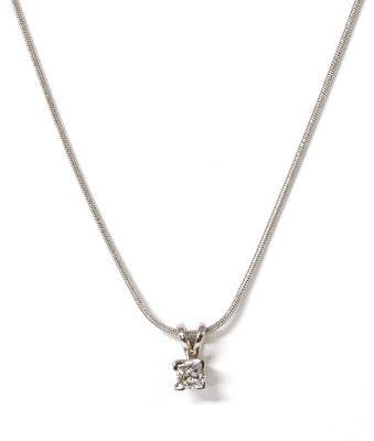 Lot 1129 - An 18ct white gold diamond pendant