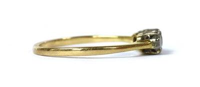 Lot 99 - A gold three stone diamond ring