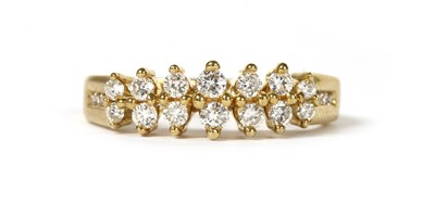 Lot 57 - An 18ct gold two row diamond ring