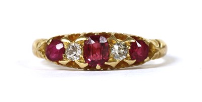 Lot 11 - An 18ct gold ruby and diamond five stone ring