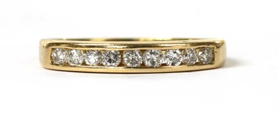 Lot 110 - A gold diamond half eternity ring