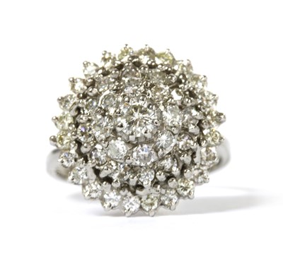Lot 86 - A white gold diamond cluster ring