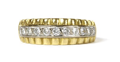 Lot 60 - A gold diamond half eternity ring