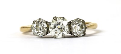 Lot 52 - A gold three stone diamond ring