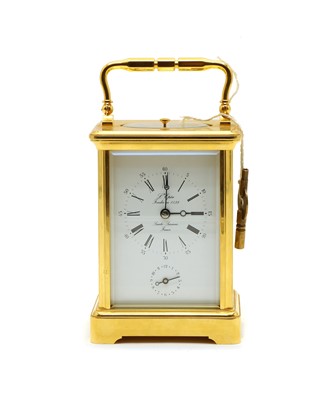 Lot 143 - A lacquered brass carriage clock