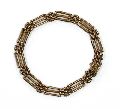 Lot 208 - A gold gate bracelet
