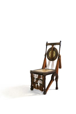 Lot 28 - A walnut and copper side chair
