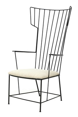 Lot 645 - A 'Lyra' iron armchair