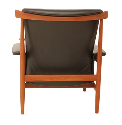 Lot 563 - A teak 'Bwana' armchair