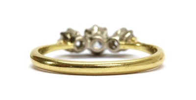 Lot 98 - An 18ct gold three stone diamond ring