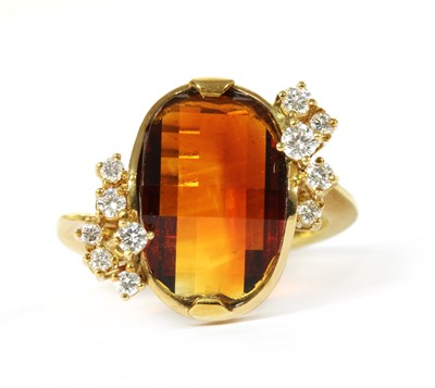 Lot 1159 - A German 18ct gold citrine and diamond ring