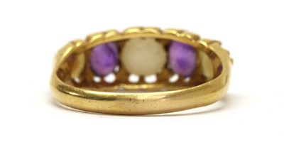 Lot 12 - A gold split pearl and amethyst five stone ring