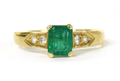Lot 1192 - An 18ct gold emerald and diamond ring