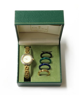 Lot 300 - A ladies' gold plated Gucci quartz bracelet watch