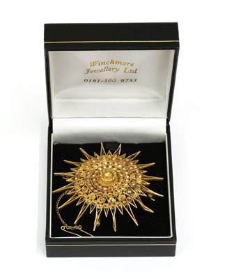 Lot 189 - A gold star brooch/pendant