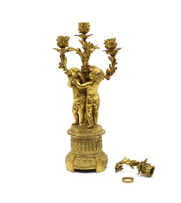 Lot 133A - A gilt metal four light candelabra