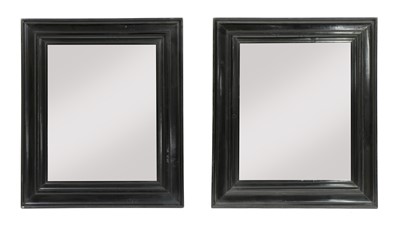 Lot 300 - A pair of ebonised mirrors