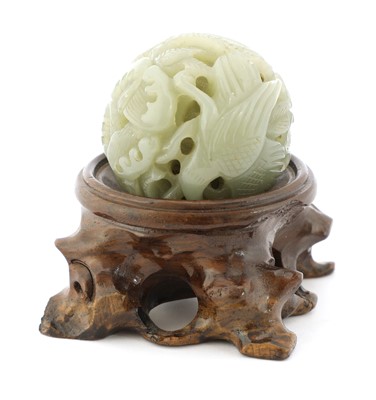 Lot 318 - A Chinese jade ball