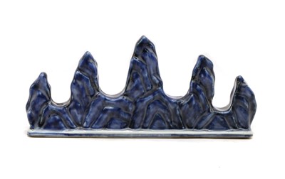 Lot 75 - A Chinese blue and white brush rest