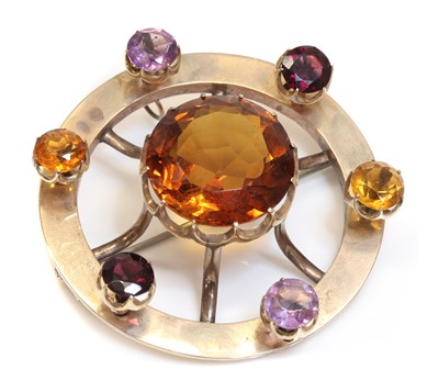 Lot 75 - A Scottish gold gemstone set wheel form brooch/pendant, c.1880