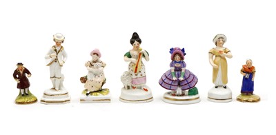 Lot 136 - Seven pottery figures