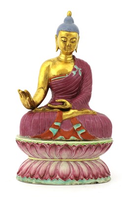 Lot 384 - A Chinese famille rose Buddha