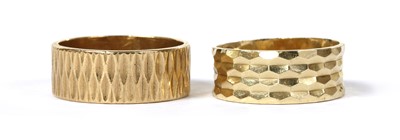 Lot 143 - Two 9ct gold patterned flat section wedding rings